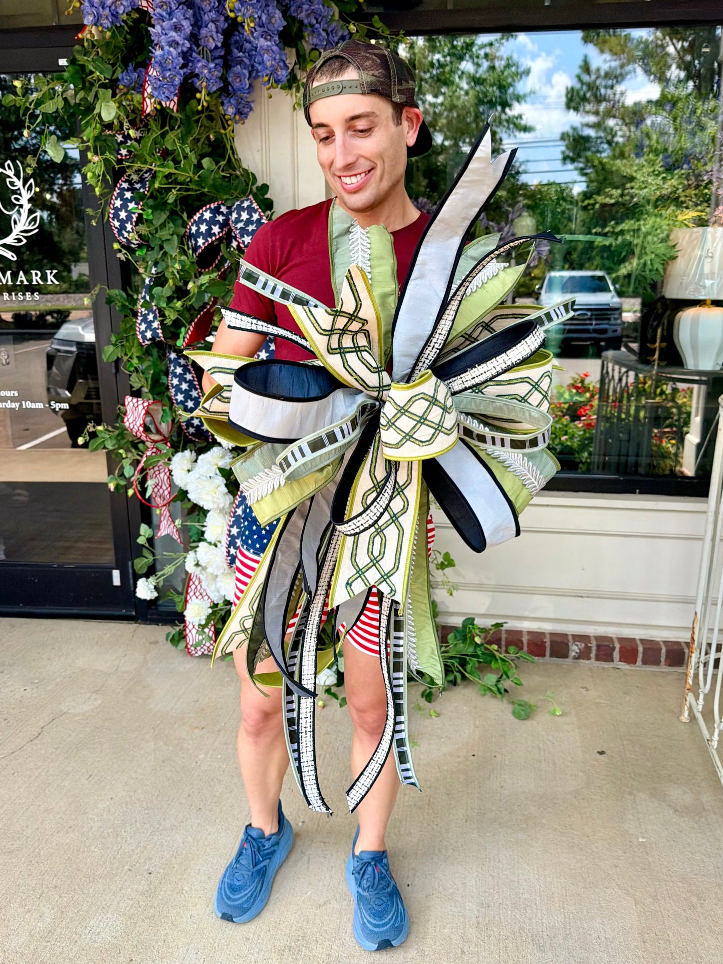 JME lux ribbon bow made with greens, tans, and neutral tones. Hand-tied by JME. Approximately 22 inches wide and 32 inches long.