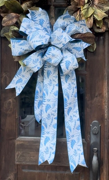 Blue fern bow. Some fluffing maybe required after receiving it.