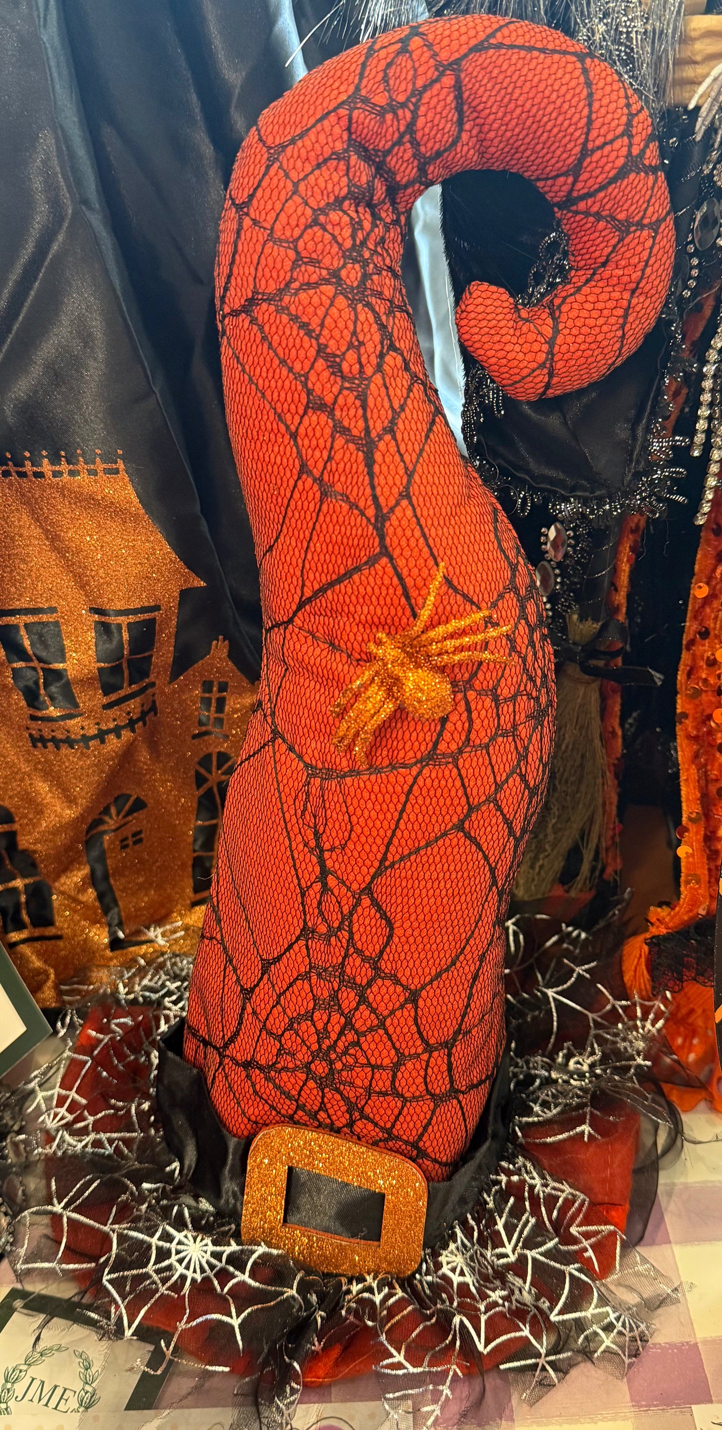 Orange spiderweb witch hat. 14 inches. Perfect for a table escaping or adding a little Halloween touch to a vignette. 