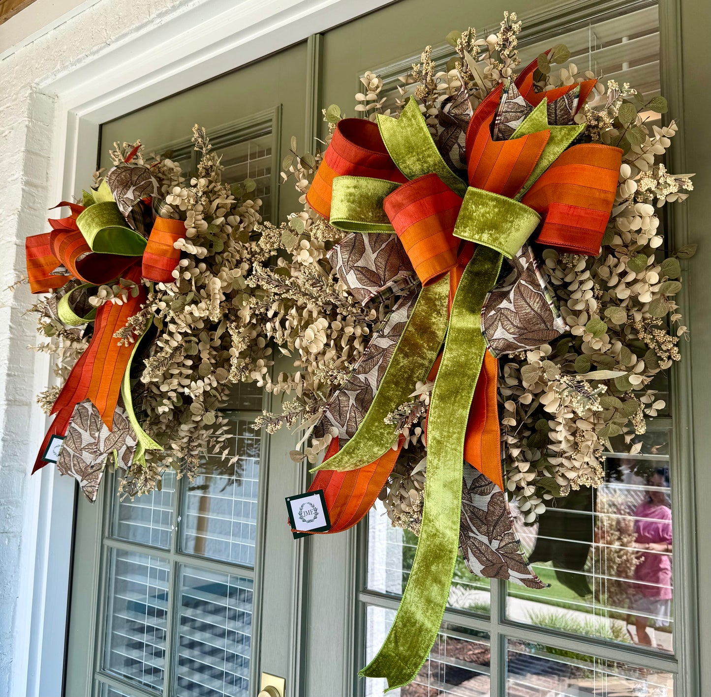 Muted Eucalyptus wreath with JME hand tied bow. About 24 inches in diameter. Shipping Monday August 18th