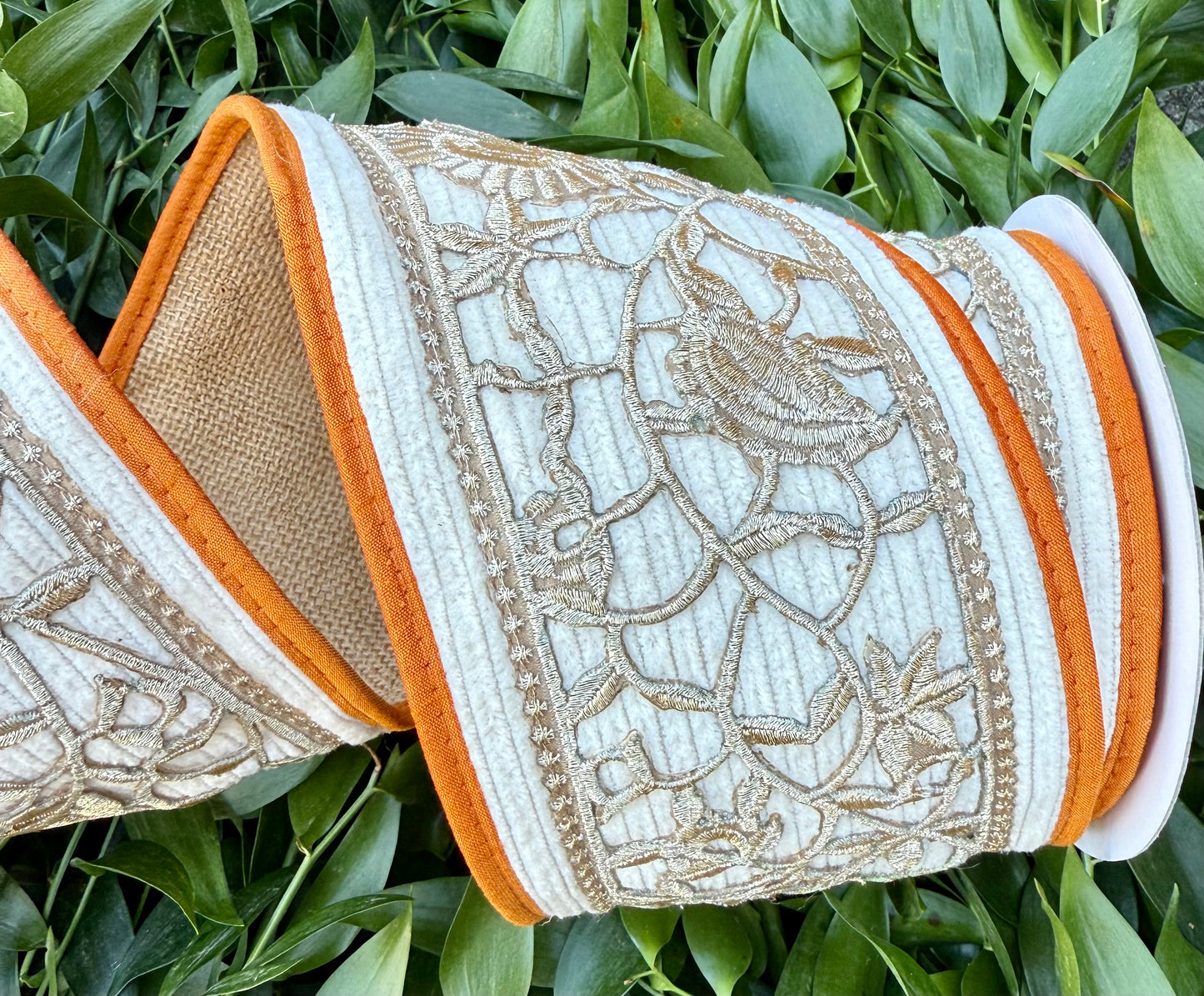 JME heavy wired ribbon. Cream Corduroy with a gold floral belt and orange piping with a burlap back. 4” x 5 yards