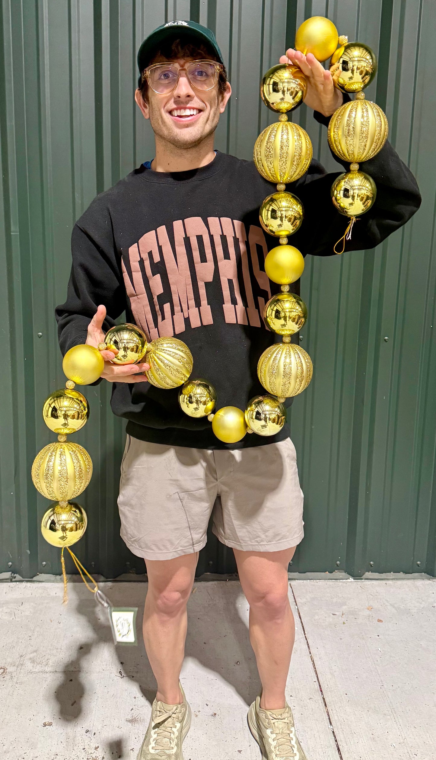 Single strand Gold ball garland. 6 feet long. Vertical striped and glitter ball garland.