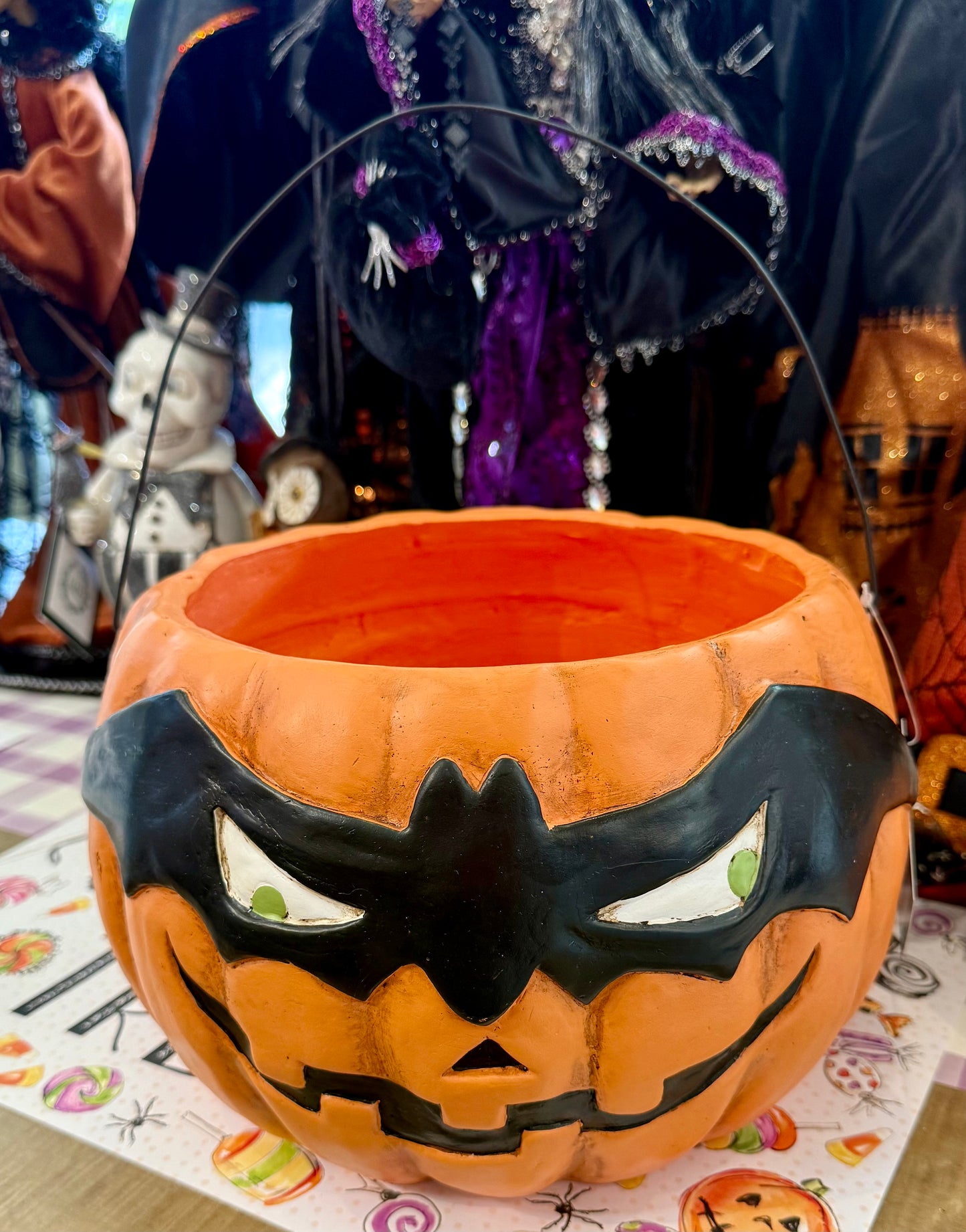 Vintage Halloween candy bucket. 10 inches jack-o’-lantern wearing a bat mask.