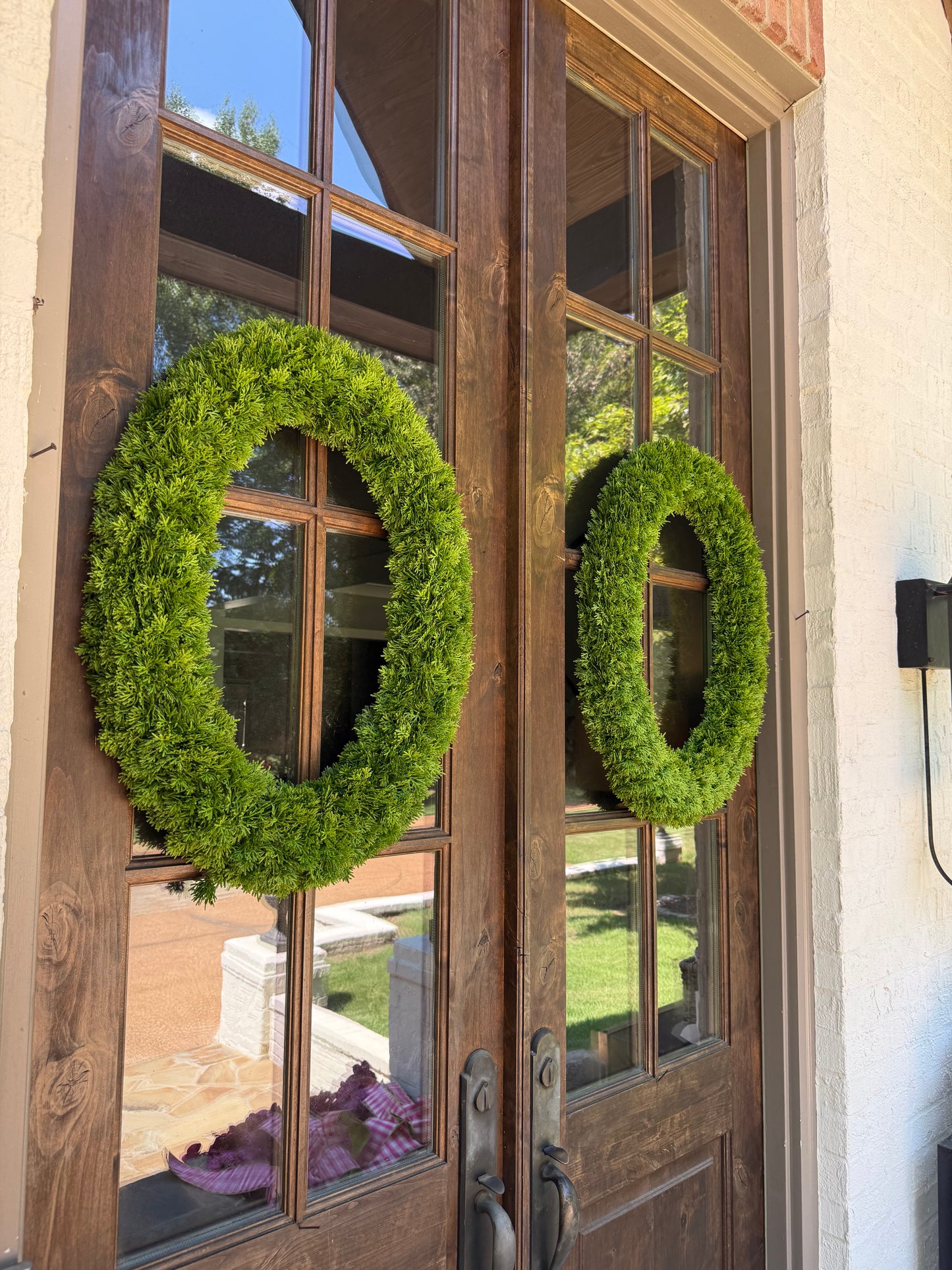 Oval Cedar Wreath. 30.5 inch long by 23 inch wide.
