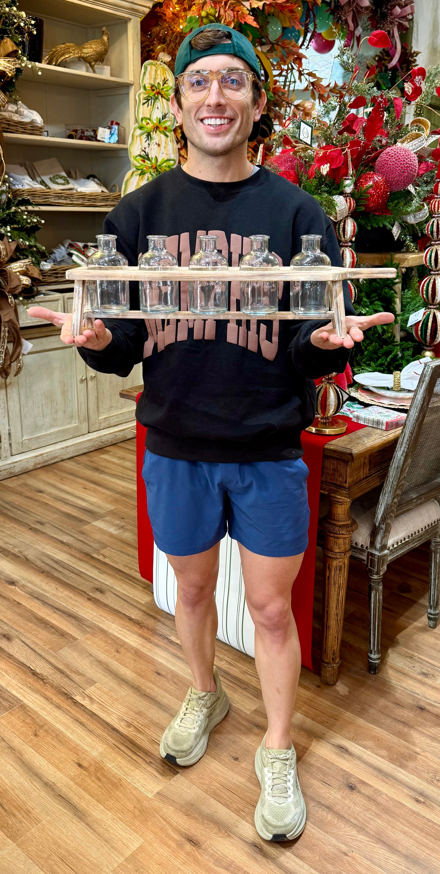 Easy arranger made of a cutting board to hold small bottles.