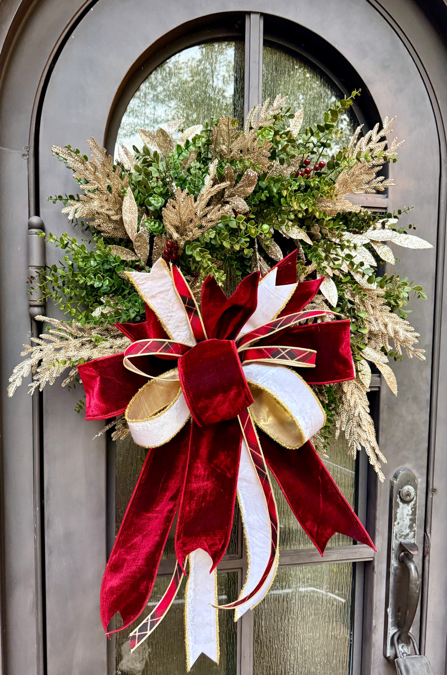 Burgundy and plaid. HANDMADE faux boxwood wreath with champagne touches and a JME hand-tied bow.