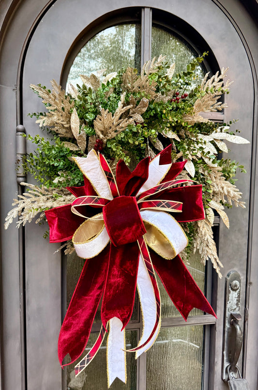 Burgundy and plaid. HANDMADE faux boxwood wreath with champagne touches and a JME hand-tied bow.