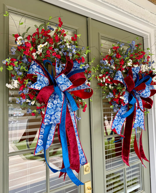 Patriotic faux wild flower wreath with JME hand tied bow! 24 inches. *some fluffing my be required upon receiving*