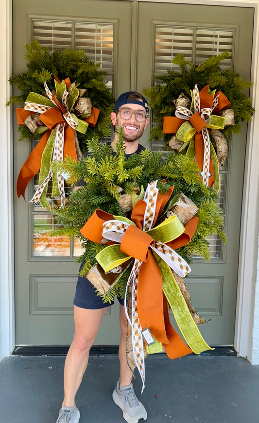 Lush Noble pine wreath with JME hand tied bow. Perfect wreath to switch bows out for Christmas or winter. About 24inches in diameter. Shipping Monday August 18th.