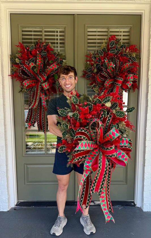 Red and green Traditional wreath. Hand made wreath by JME. About 24 inches wide.