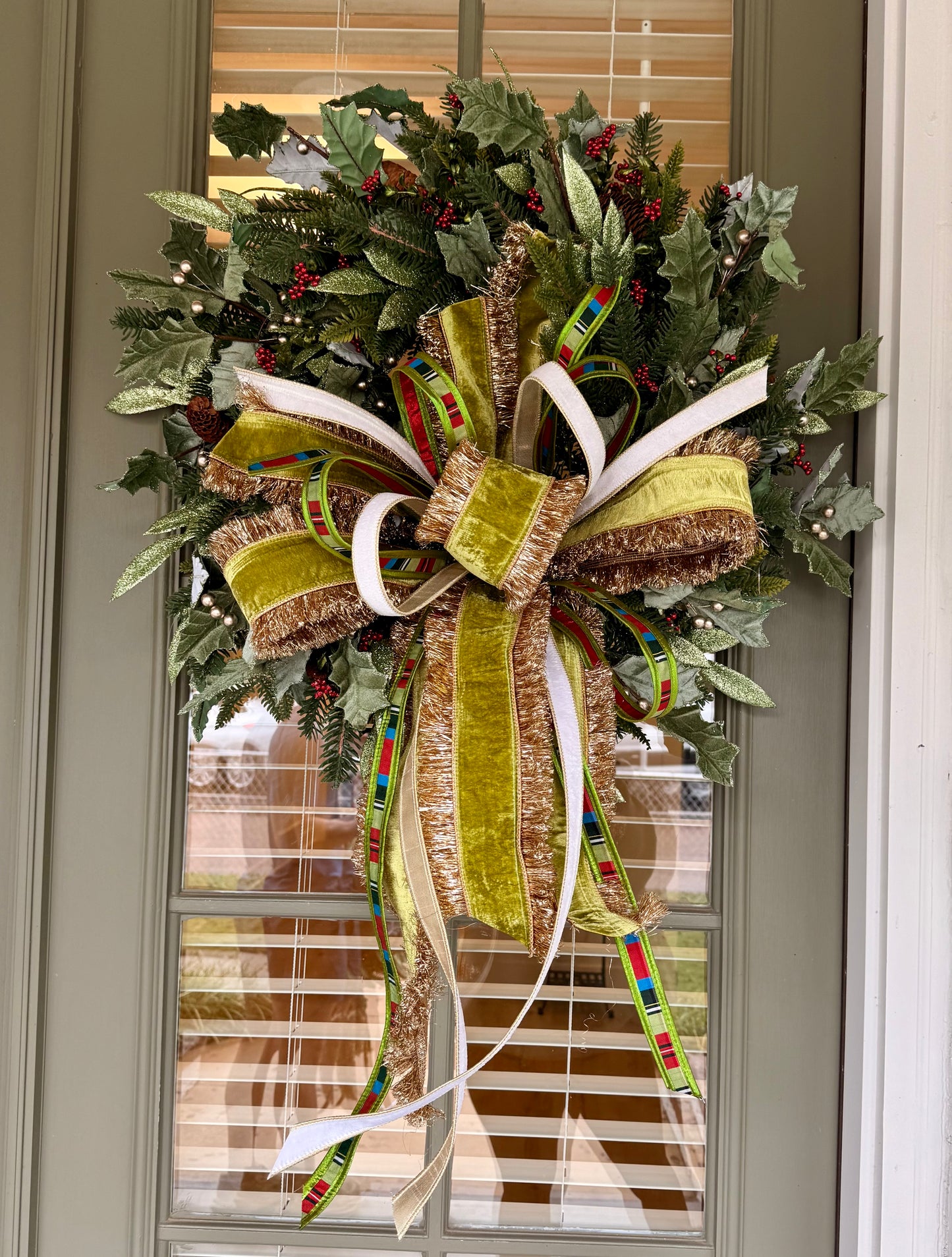 Fringe Bow wreath. Handmade wreath by JME with a JM hand-tied bow. About 24 inches wide