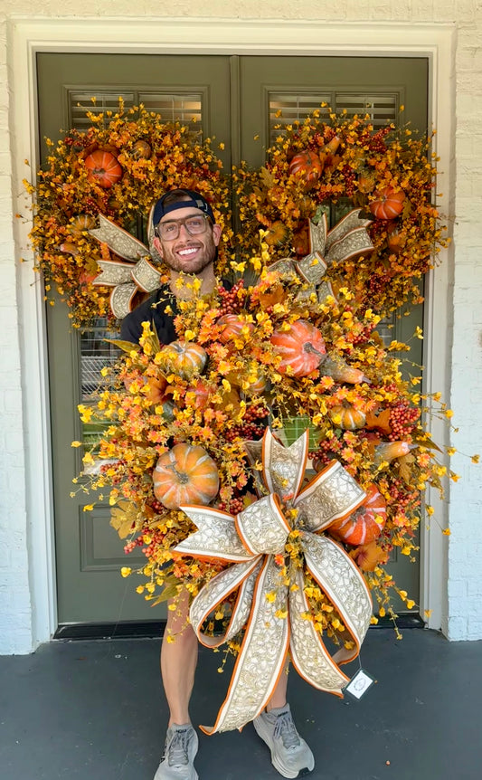 Handmade JME pumpkin meadow wreath. With a handtied JME bow. About 32 inches wide. Shipping Monday August 18th.