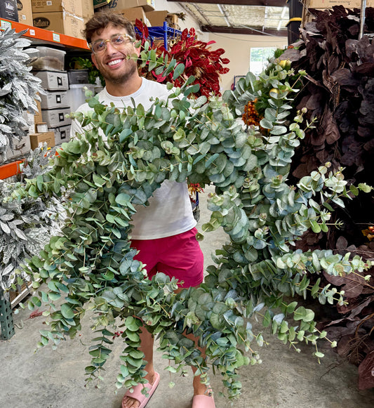 Faux baby blue eucalyptus wreath. Very full and life like! 42 inches wide.