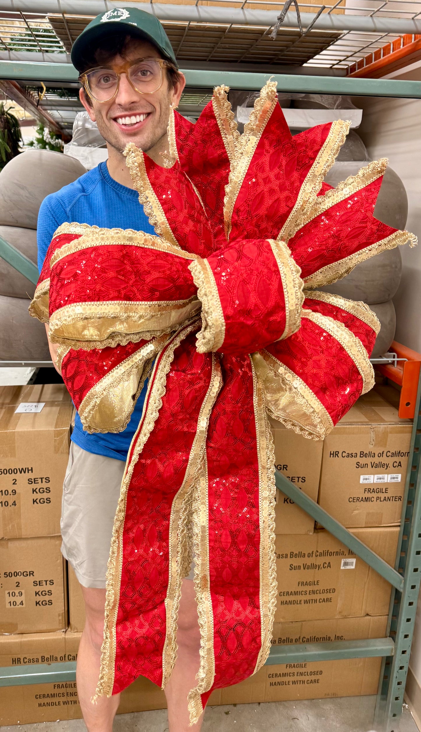 RED sequin with gold trim Hand-tied JME bow. 10 yard bow 5inch ribbon. About 2 foot wide by 3 feet long.