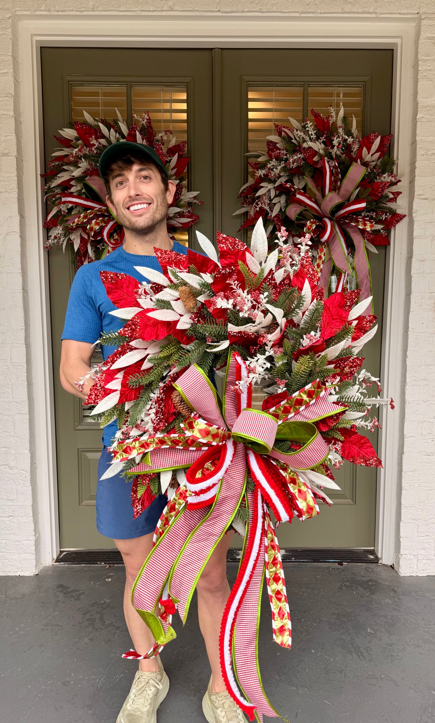 Candy Cane inspired wreath. Handmade by JME paired with a JM hand tied bow. About 24inches wide.