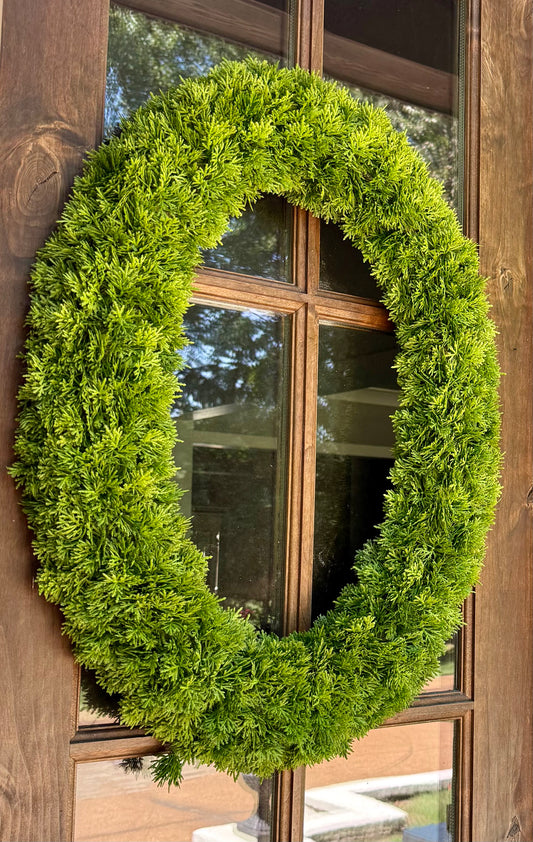 Oval Cedar Wreath. 30.5 inch long by 23 inch wide.