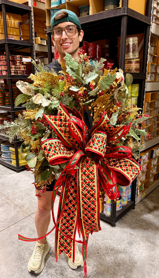 Glitz and bling handmade wreath by JME WITH JINGLE BELLS paired with a hand tied bow by JM. about 24inches wide.