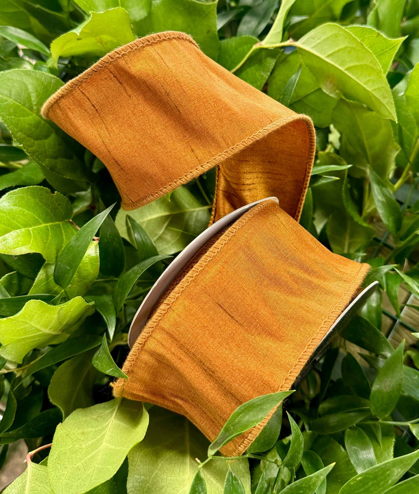 JME heavy wired ribbon. Dupion heavy wired ribbon. Rust color. 2.5 inches by 10 yards