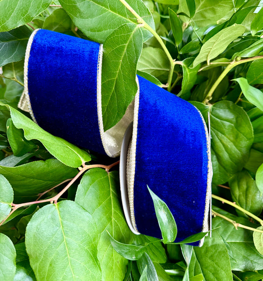 JME heavy wired ribbon. Royal blue velvet backed with gold metallic dupion. 2.5“ x 10 yards