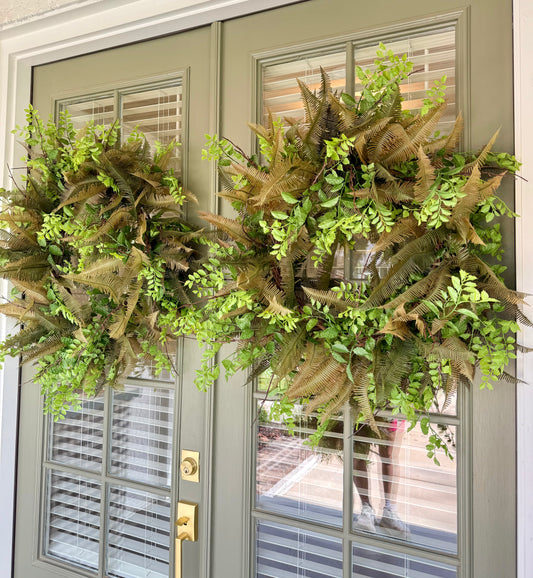 JME mixed faux fern wreath. 30 inches wide.