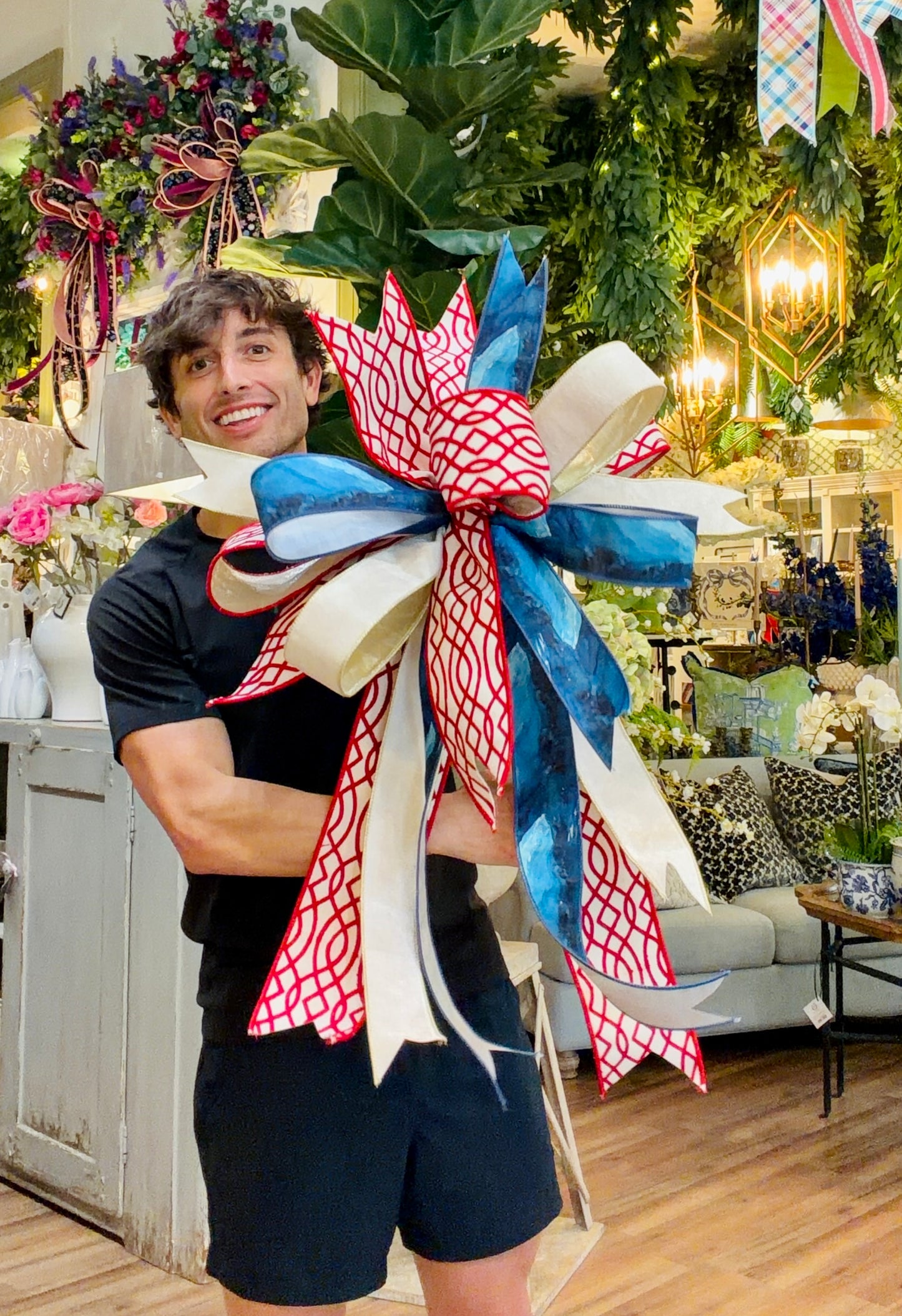 Patriotic JME hand tied bow. Some fluffing might be required upon receiving. Approximately 23 inches wide by 30 inches long.