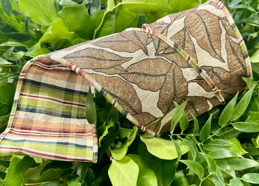 JME heavy wired ribbon. Leaf Pattern with dupion Plaid Back and piping. Heavy wired ribbon. 4 inches by 10 yards.