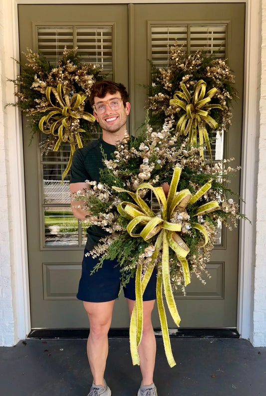 Faux Cedar and champagne eucalyptus wreath. Hand made wreath by JME. About 24 inches wide.