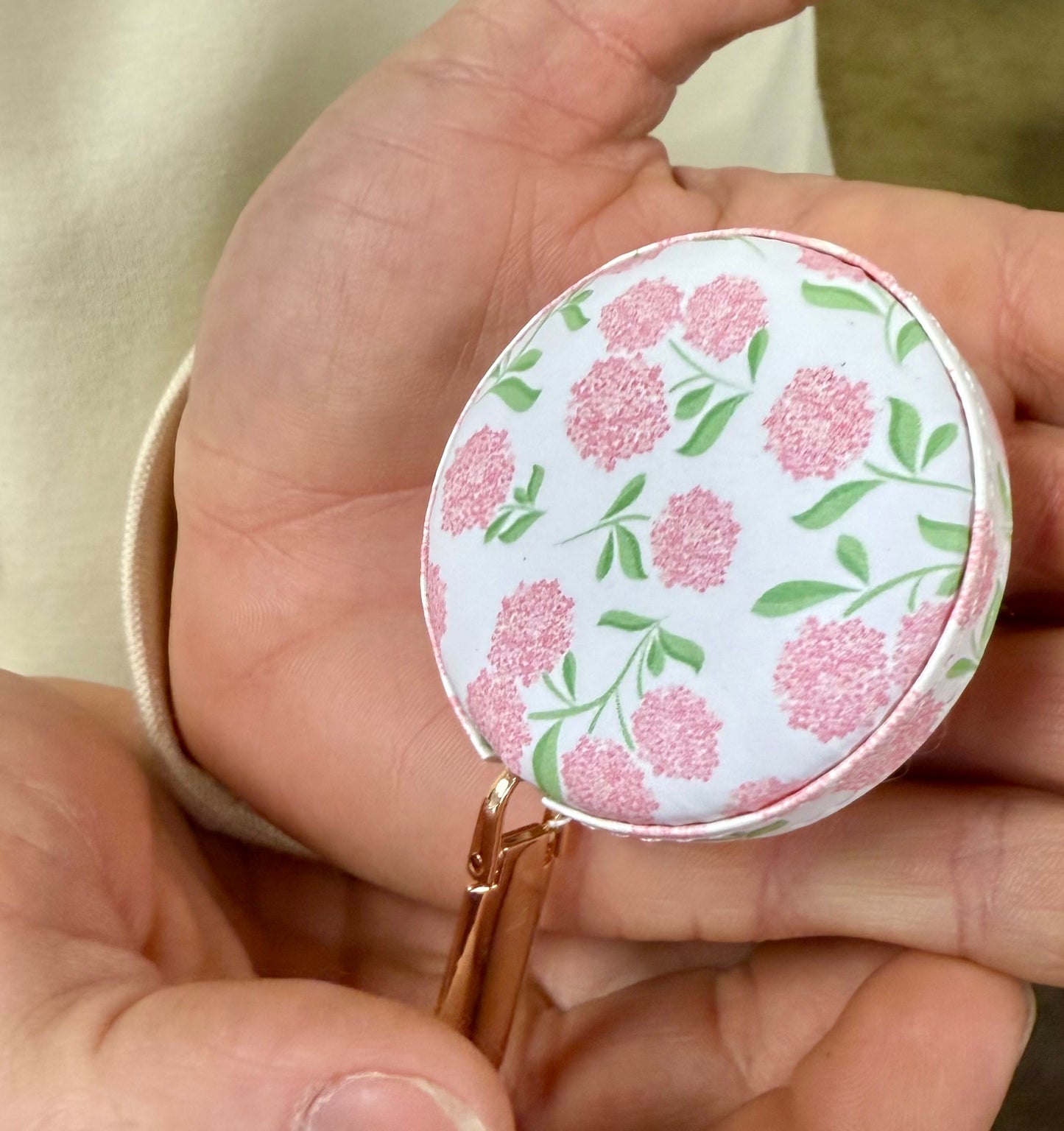 Pocket tape measure. Pink hydrangeas