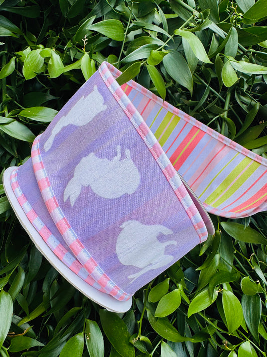 JME heavy wired ribbon. Lavender Bunnies with Pink/White Trim and Pink/Lime Striped Back 2.5"x 10YDS