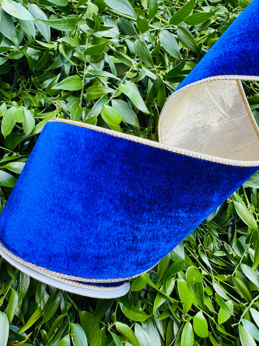 JME heavy wired ribbon. Royal blue velvet backed with gold metallic dupion. 4“ x 10 yards