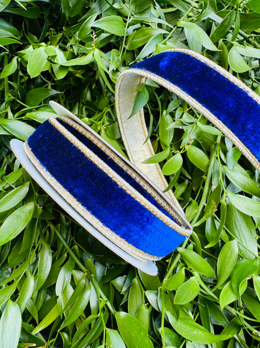 JME heavy wired ribbon. Royal blue velvet backed with gold metallic dupion. 1“ x 10 yards