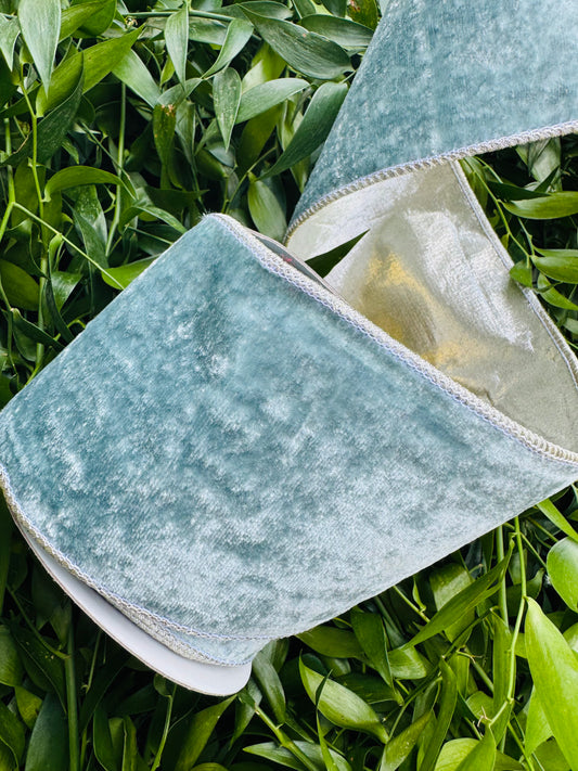 JME heavy wired ribbon. Aqua velvet with Champagne metallic back 4" x 10 yards